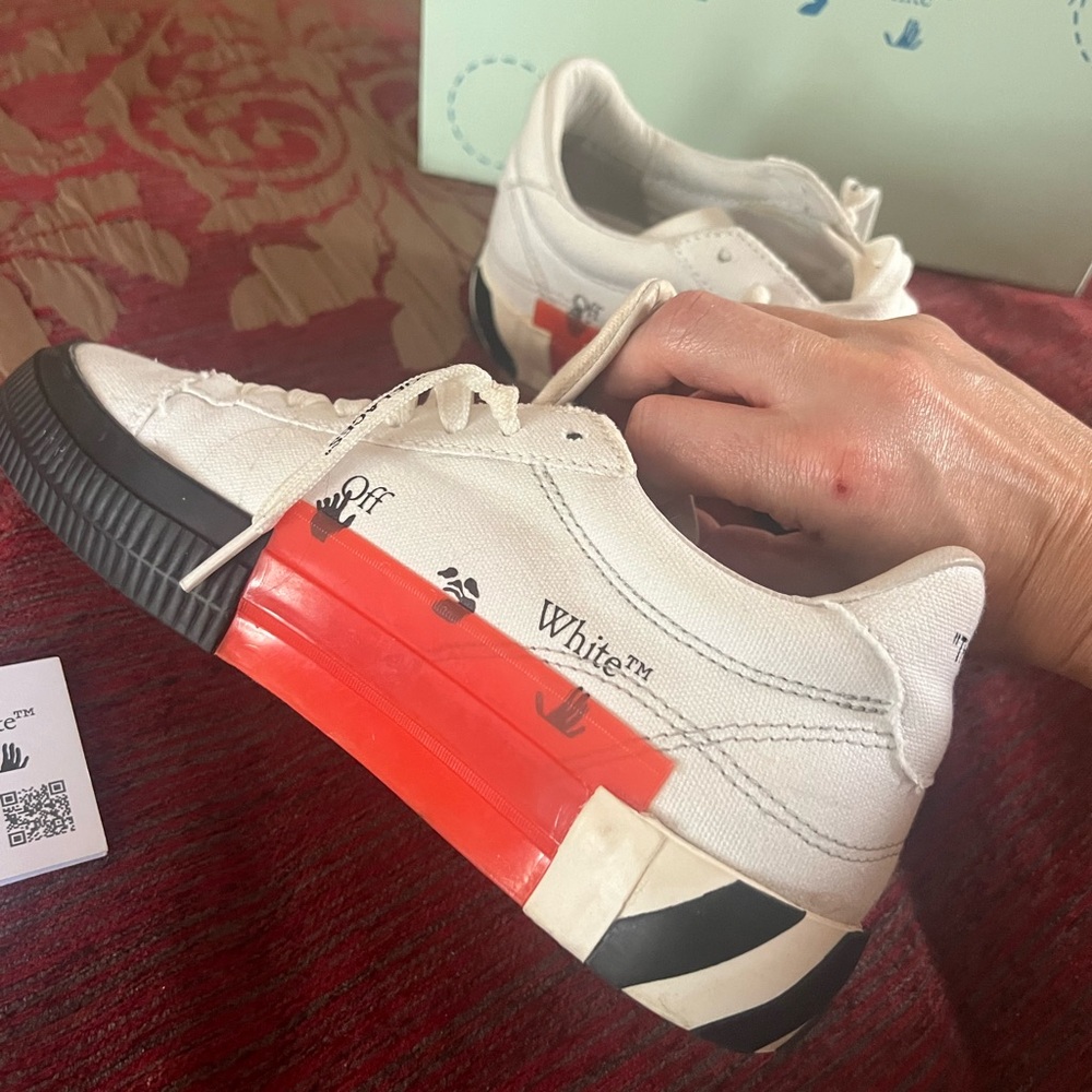Off-White Canvas Sneakers with Orange and Black Accents